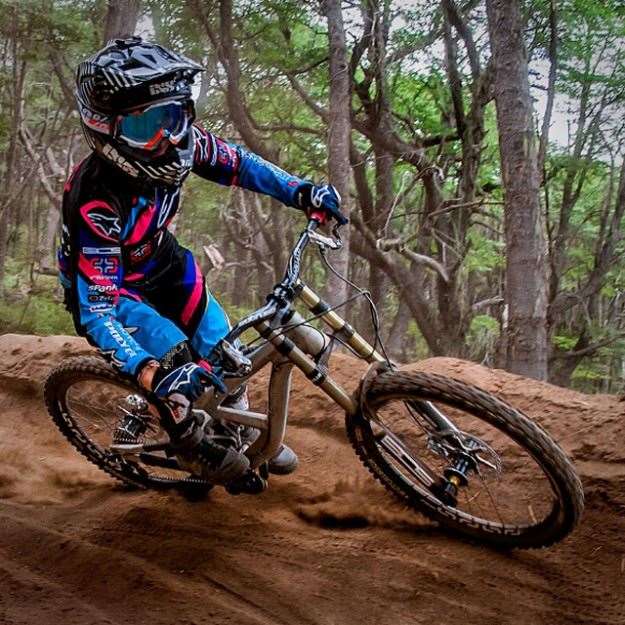 Tracey Hannah ripping a berm