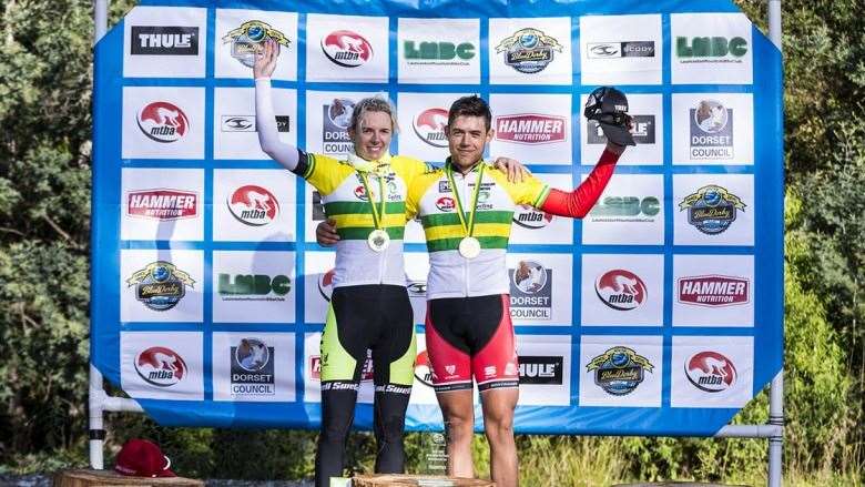 Elite womens winner Jenny Blair and elite mens winner Brendan Johnston at the podium_Credit_Heath_Holden