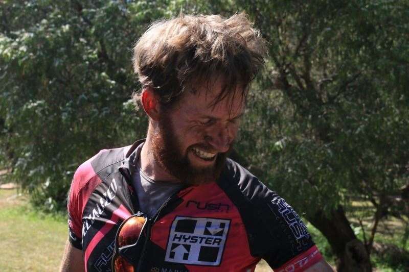 Rohin Adams shows the effort of the day once across the line.