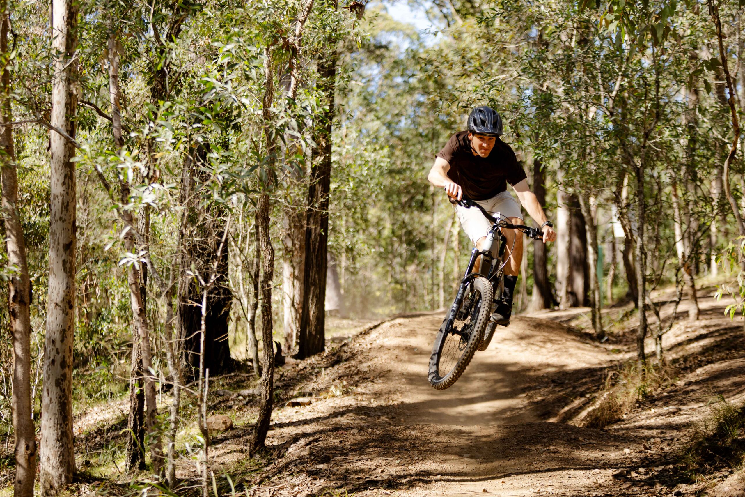 Cameron Allonby riding the Amflow PR on a forest trail
